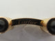 Boutons de manchette Cartier Décors Ressorts - Boutons de manchette en or rose et onyx 58 Facettes 274667