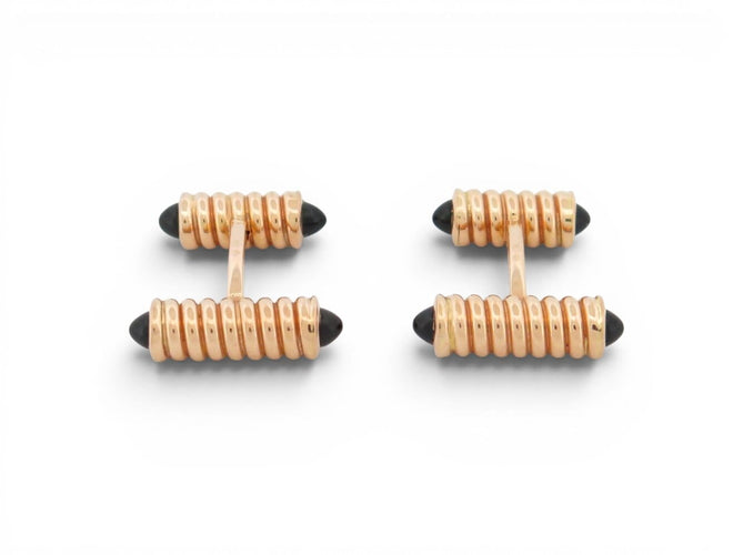 Boutons de manchette Cartier Décors Ressorts - Boutons de manchette en or rose et onyx 58 Facettes 274667