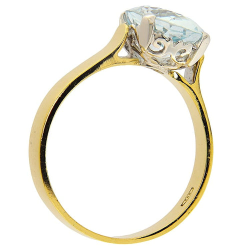 Bague 63 Bague solitaire en or jaune et blanc avec aigue-marine ovale 58 Facettes G3978