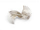 Broche Broche ruban torsadé en or blanc 18K et diamants 58 Facettes 275623