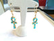 Boucles d'oreilles Boucles d'oreilles croix Ankh en or jaune et émail 58 Facettes 01373
