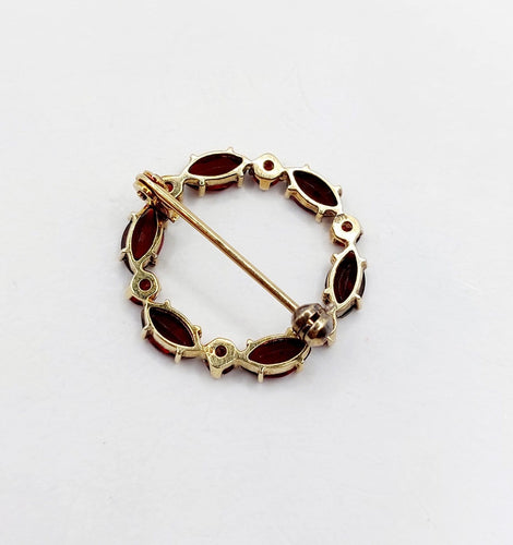 Broche Broche vintage en or 14K et grenats 58 Facettes A07478