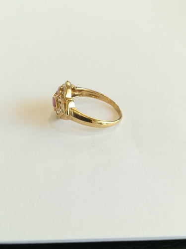 Bague 52.5 Bague losange en or jaune, rubis et diamants 58 Facettes 00947