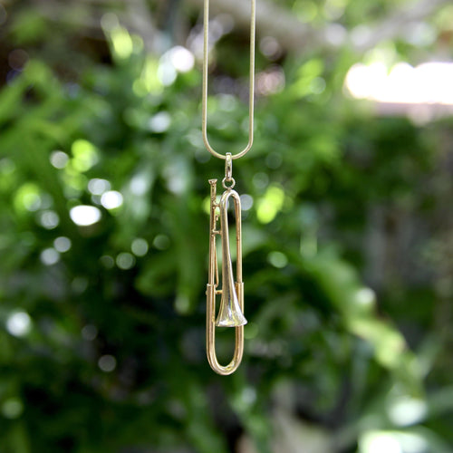 Pendentif Pendentif trombone mécanique en or 14K 58 Facettes 11149