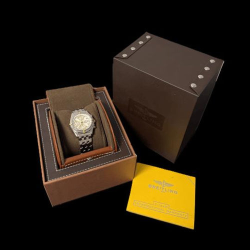Montre Breitling Chronomat - Montre chronographe en or jaune et acier 58 Facettes MT46201