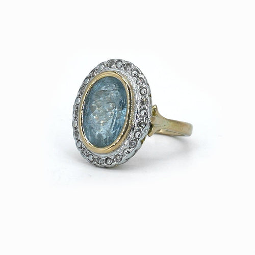 Bague 50 Bague entourage en or jaune 18 carats, aigue-marine et diamants 58 Facettes Bague 131-1