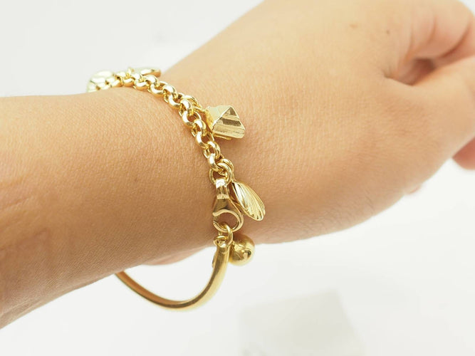 Bracelet Bracelet breloques en or jaune 18 carats et perles 58 Facettes 33799