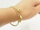Bracelet Bracelet breloques en or jaune 18 carats et perles 58 Facettes 33799