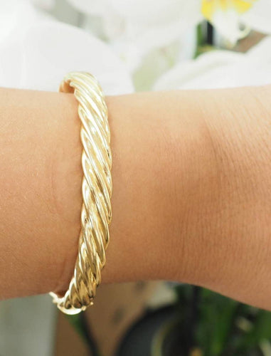 Bracelet Bracelet jonc torsadé en or jaune 58 Facettes 33800