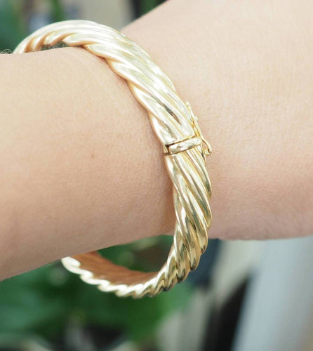 Bracelet Bracelet jonc torsadé en or jaune 58 Facettes 33800