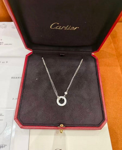 Pendentif Cartier Love - Pendentif en or gris et diamants 58 Facettes jnci124