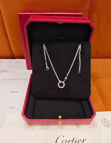 Pendentif Cartier Love - Pendentif en or gris et diamants 58 Facettes jnci124
