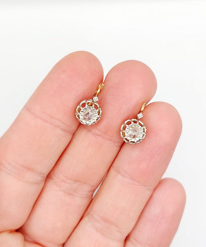 Boucles d'oreilles Dormeuses fleurs de lys en or 18k, platine et diamants taille rose 58 Facettes A07517