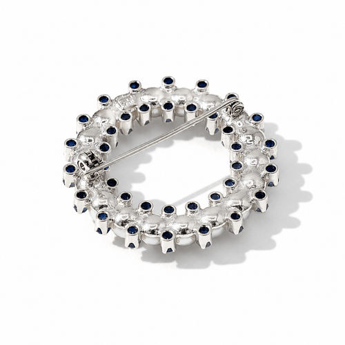 Broche Broche ronde en or blanc, saphirs et perles de culture 58 Facettes 9070/19