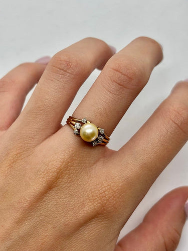 Bague 53 Bague ancienne en or jaune 18K, perle et diamants 58 Facettes 2025