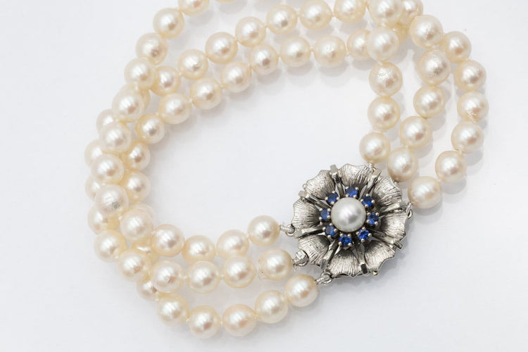 Bracelet Bracelet de perles avec fermoir en or blanc et saphirs 58 Facettes 12376