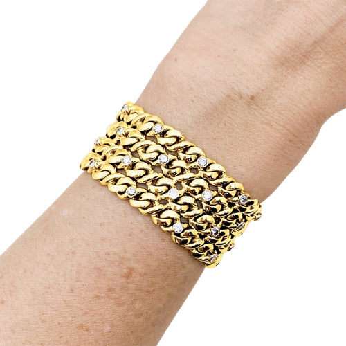 Bracelet Bracelet ruban en or jaune, platine et diamants 58 Facettes 35796
