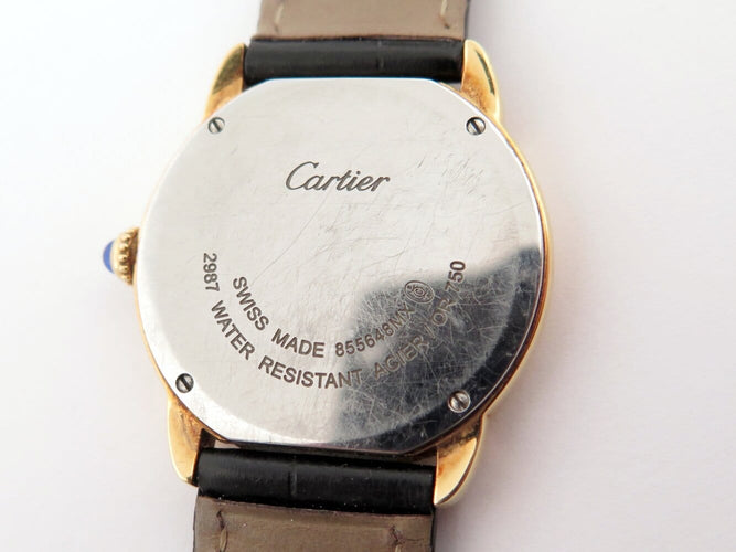 Montre Cartier Ronde Solo - Montre 29 mm en or jaune et acier 58 Facettes 275588