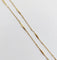Collier Collier chaîne vintage en or 18K à mailles forçat 58 Facettes A07405