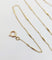 Collier Collier chaîne vintage en or 18K à mailles forçat 58 Facettes A07405