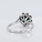 Bague 53 Bague marguerite en or blanc, émeraude et diamants 58 Facettes R007