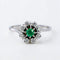 Bague 53 Bague marguerite en or blanc, émeraude et diamants 58 Facettes R007