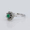Bague 53 Bague marguerite en or blanc, émeraude et diamants 58 Facettes R007