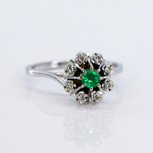 Bague 53 Bague marguerite en or blanc, émeraude et diamants 58 Facettes R007