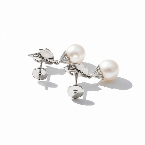 Boucles d'oreilles Boucles d’oreilles feuillage en or blanc, diamants et perles de culture 58 Facettes 1.00001322/2