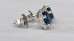 Boucles d'oreilles Boucles d'oreilles halo en or blanc, topazes London Blue et diamants 58 Facettes earrings