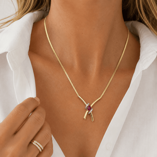 Collier Collier vintage en or jaune, rubis et diamants 58 Facettes rubis