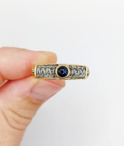 Bague 64 Bague chevalière vintage en or 18k, acier et saphir 58 Facettes A07432