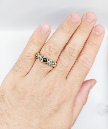 Bague 64 Bague chevalière vintage en or 18k, acier et saphir 58 Facettes A07432