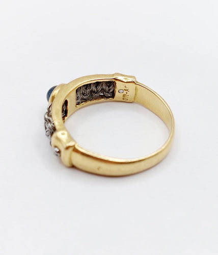 Bague 64 Bague chevalière vintage en or 18k, acier et saphir 58 Facettes A07432