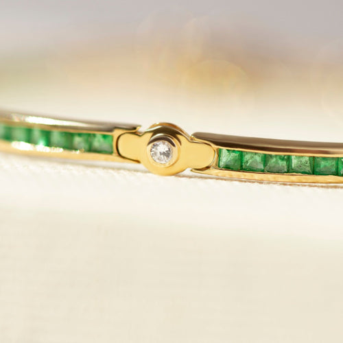 Bracelet Bracelet tennis en or jaune avec émeraudes et diamants 58 Facettes
