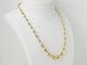 Collier Collier marseillais - Collier boules en chute en or jaune 58 Facettes 33480