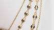 Collier Collier esclave en or jaune émaillé, pierres vertes et perles 58 Facettes 32174