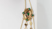 Collier Collier esclave en or jaune émaillé, pierres vertes et perles 58 Facettes 32174