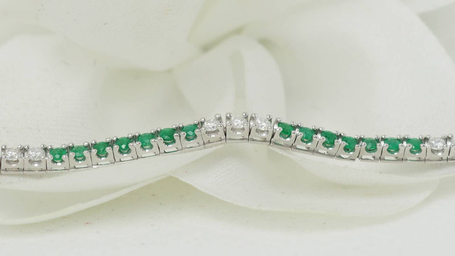 Bracelet 18cm Bracelet rivière en or blanc, émeraudes et diamants 58 Facettes 32238