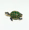 Broche Gübelin - Broche tortue en or jaune, émeraudes, saphirs et diamants 58 Facettes Gubelin