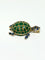 Broche Gübelin - Broche tortue en or jaune, émeraudes, saphirs et diamants 58 Facettes Gubelin