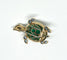 Broche Gübelin - Broche tortue en or jaune, émeraudes, saphirs et diamants 58 Facettes Gubelin