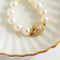 Collier Collier de perles de culture en or jaune 14 carats et diamants 58 Facettes HJ062613