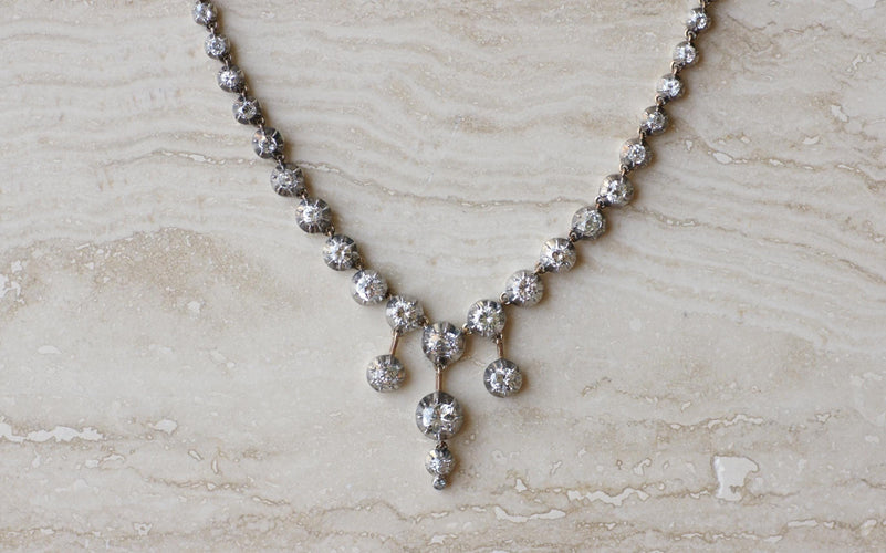 Collier Collier rivière ancien en or, argent et diamants 58 Facettes