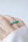 Bague 53 Bague jarretière en or jaune, turquoises et diamants 58 Facettes