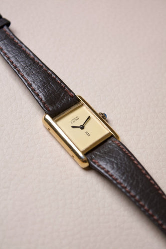 Montre Cartier Tank Must - Montre en vermeil cadran jaune citron 58 Facettes MONTRE-008
