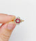 Bague 53 Bague cible Art déco en or 18K, diamants et rubis synthétiques 58 Facettes A07449