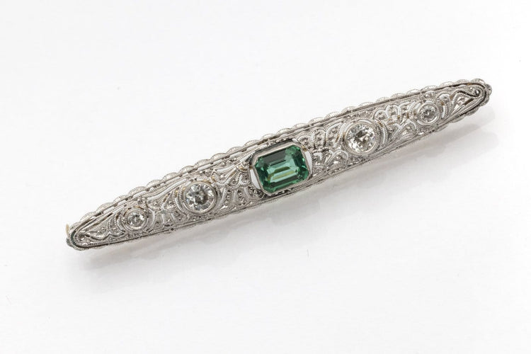 Broche Broche ancienne en platine, or jaune, diamants et tourmaline 58 Facettes 12397
