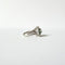 Bague 44 Bague en or gris, diamants et émeraudes vers 1950 58 Facettes