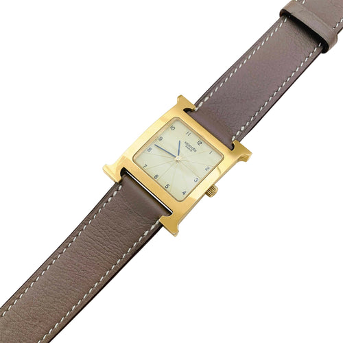 Montre Hermès Heure H - Montre en plaqué or et acier 58 Facettes 35492